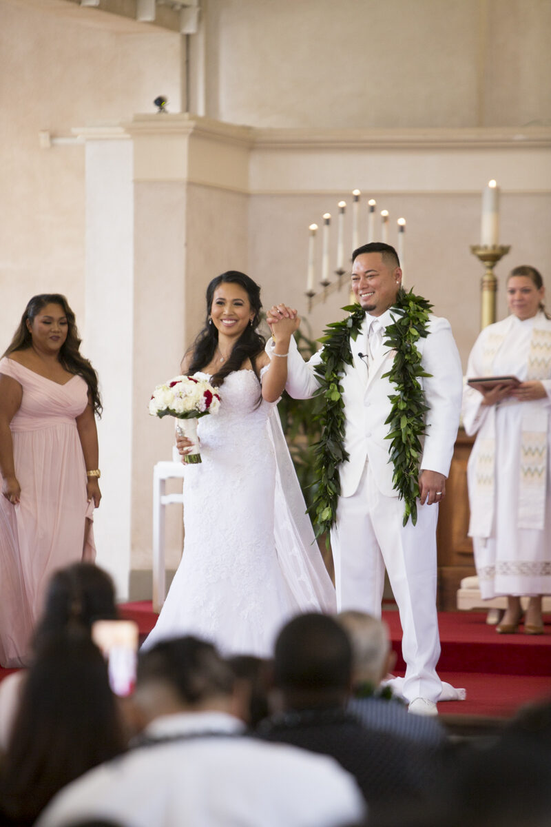Newlyweds just married after the ceremony, Hawaii wedding photography